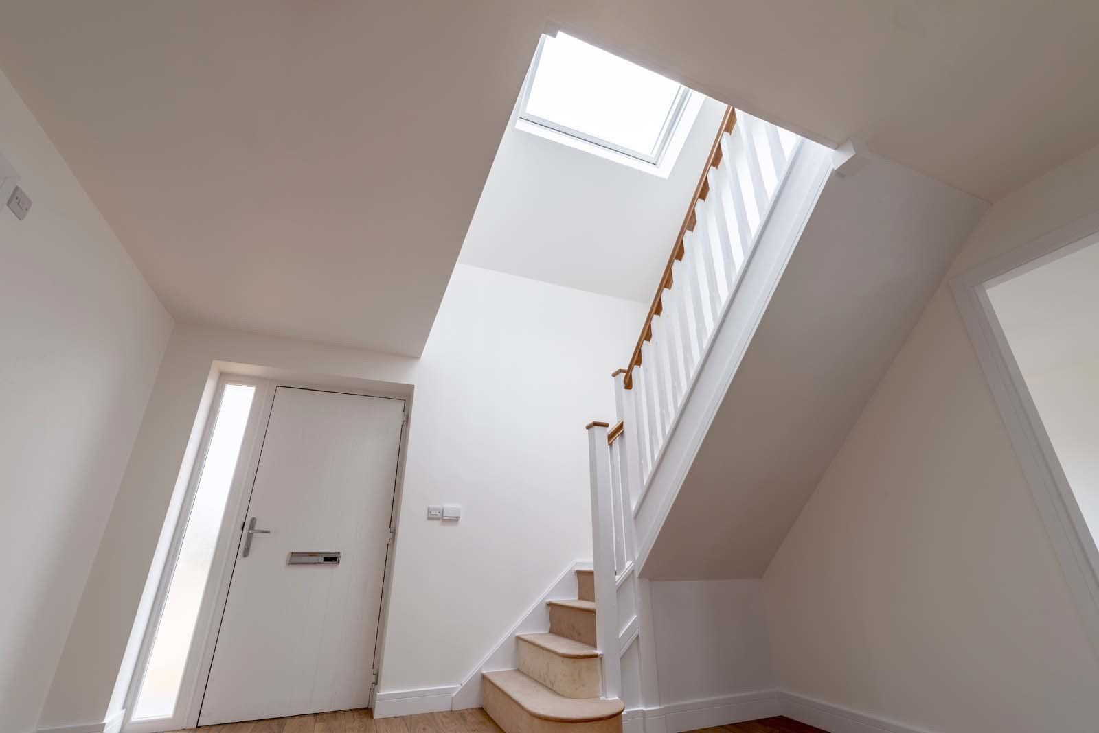 Modern staircase connecting floors in a newly built dormer bungalow in Cheshire