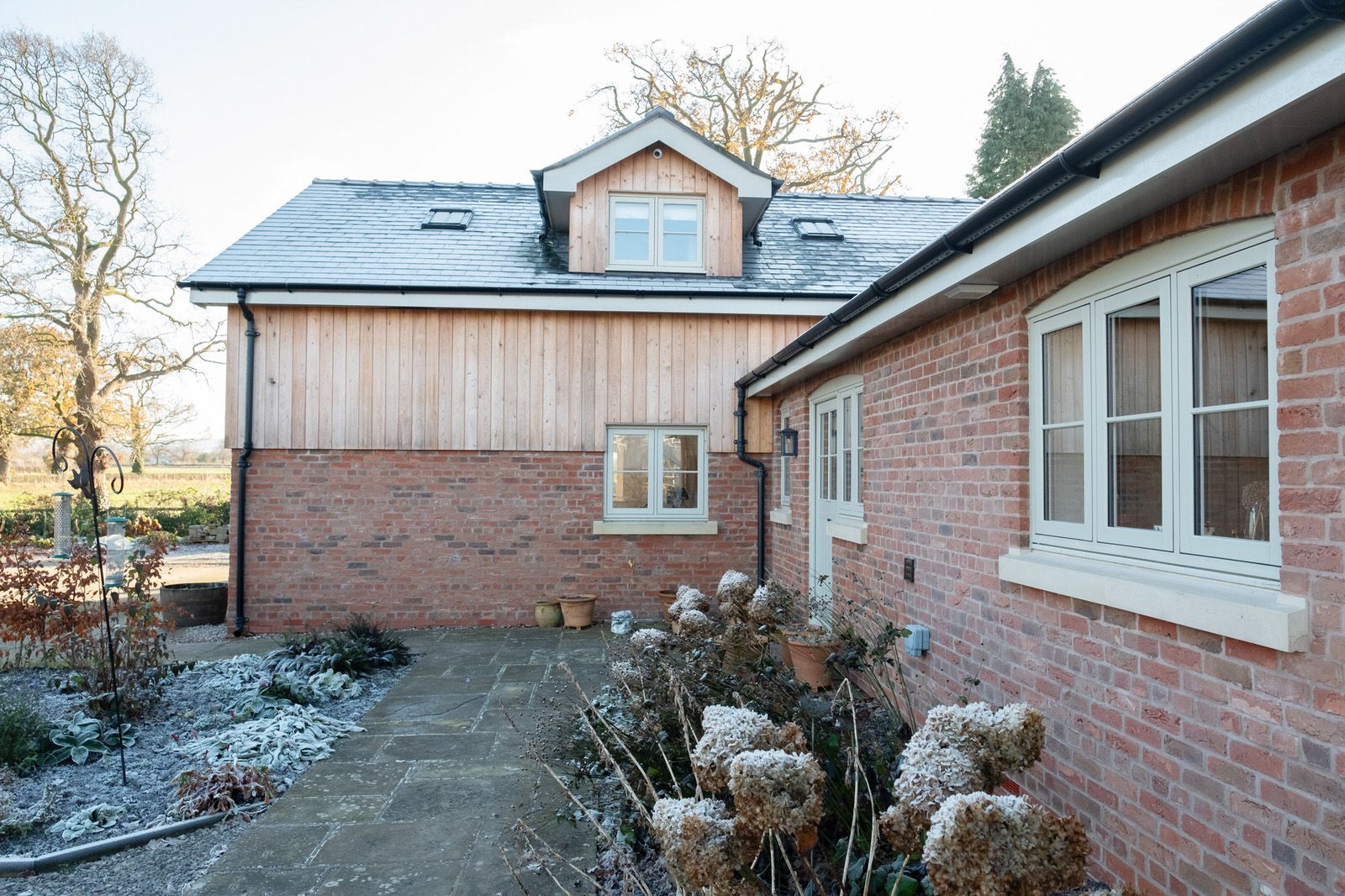 Exterior view of luxury Cheshire new build in traditional, farmhouse style