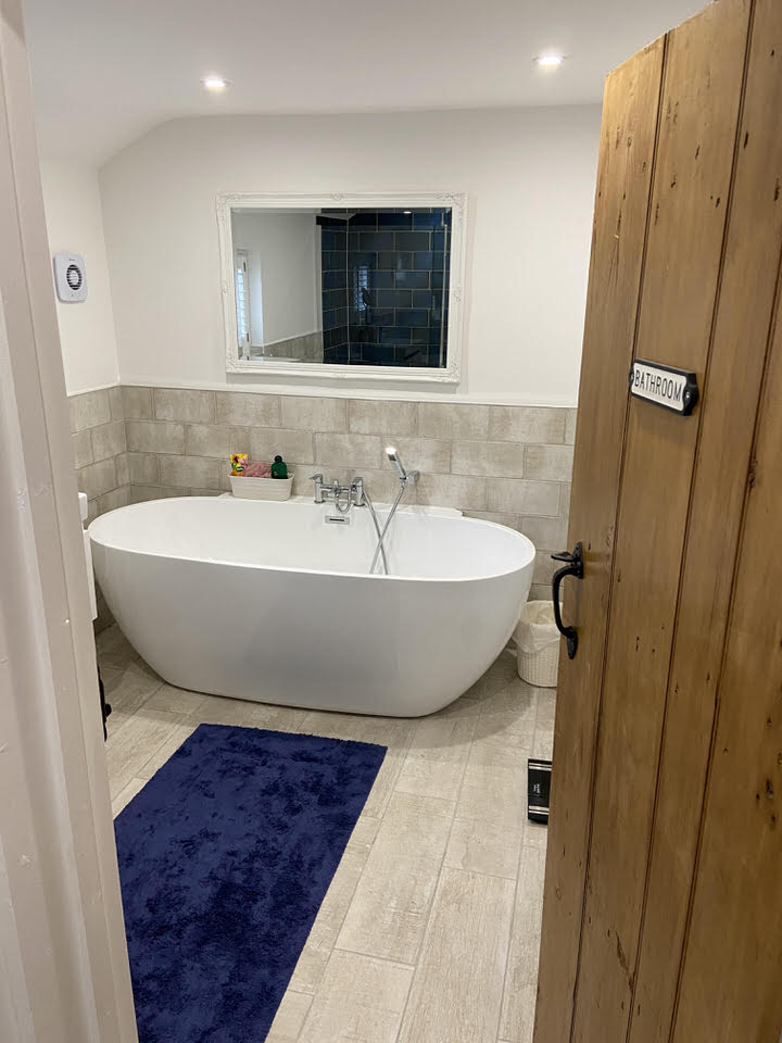 Spacious bathroom with premium finishes in Cheshire terrace cottage renovation and extension