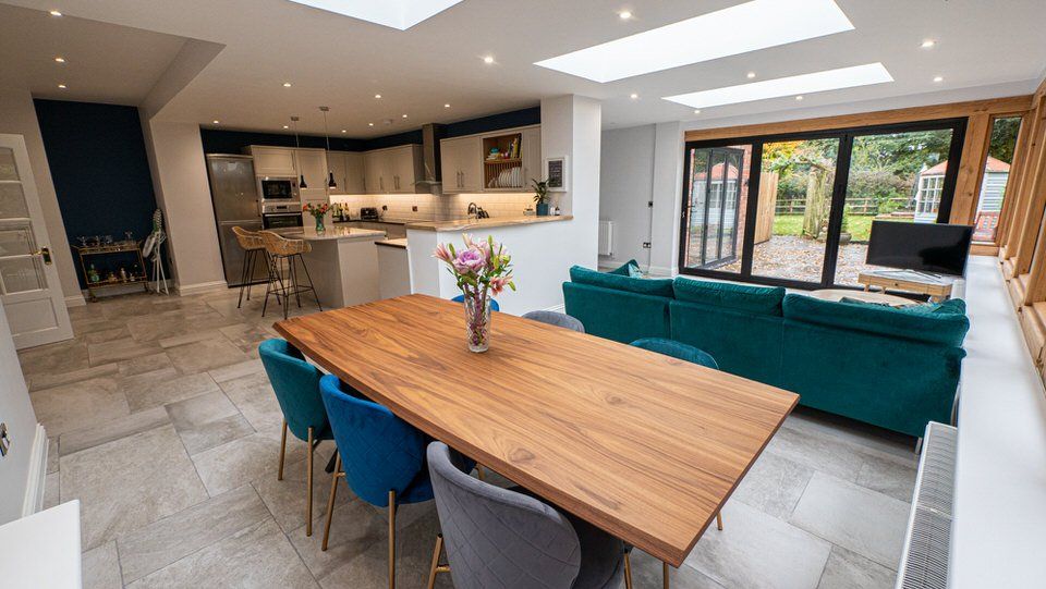 Open-plan living space within oak-frame home extension in Cheshire featuring modern layout and natural light