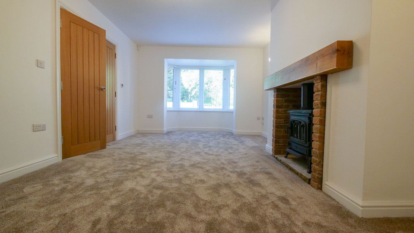 Spacious lounge in Cheshire new build property with modern design and high-quality finishes