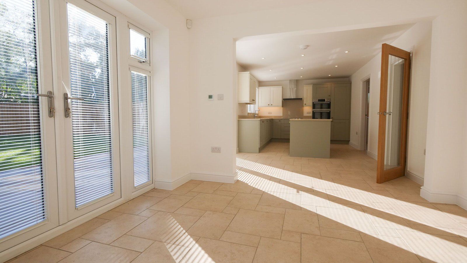 Spacious open-plan living area in Cheshire new build property by Rawlinson Construction