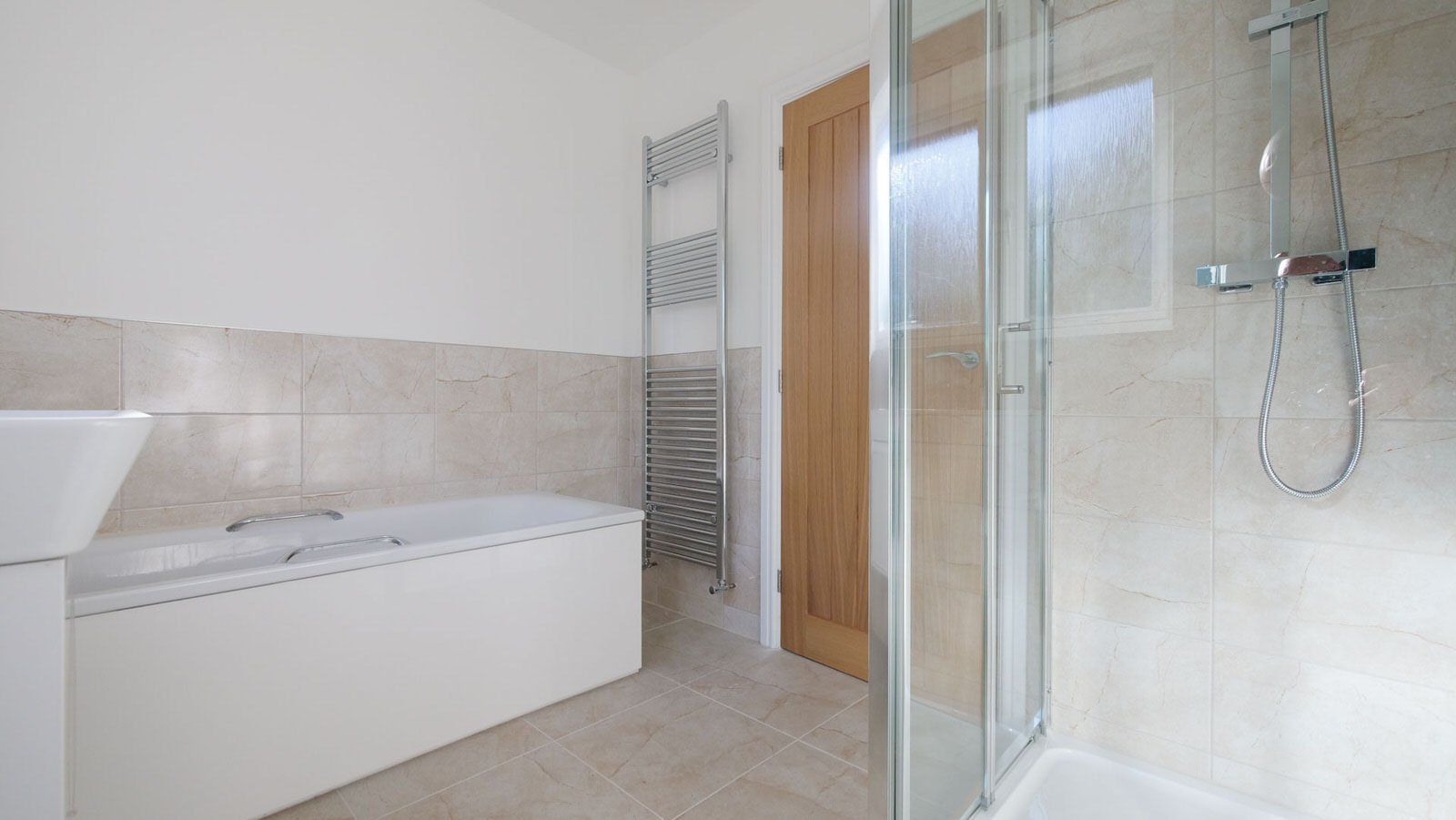 Family bathroom in new build Cheshire home delivered by Rawlinson Construction
