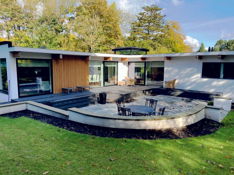 Exterior view of Prestbury home renovated by Rawlinson Construction with contemporary design and energy-efficient construction
