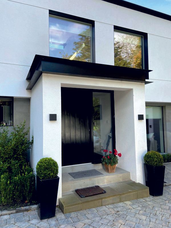 Entrance to modernised family home renovated by Rawlinson Construction in Prestbury