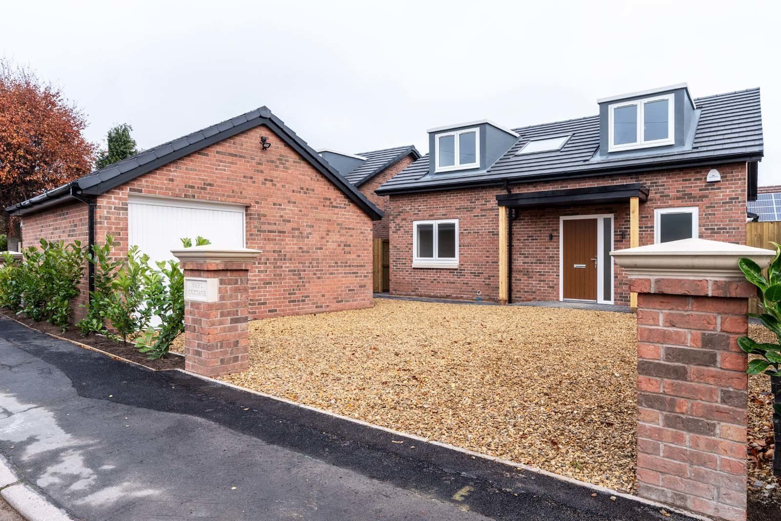 New build property in Cheshire showcasing modern dormer design and high-quality craftsmanship by Rawlinson Construction