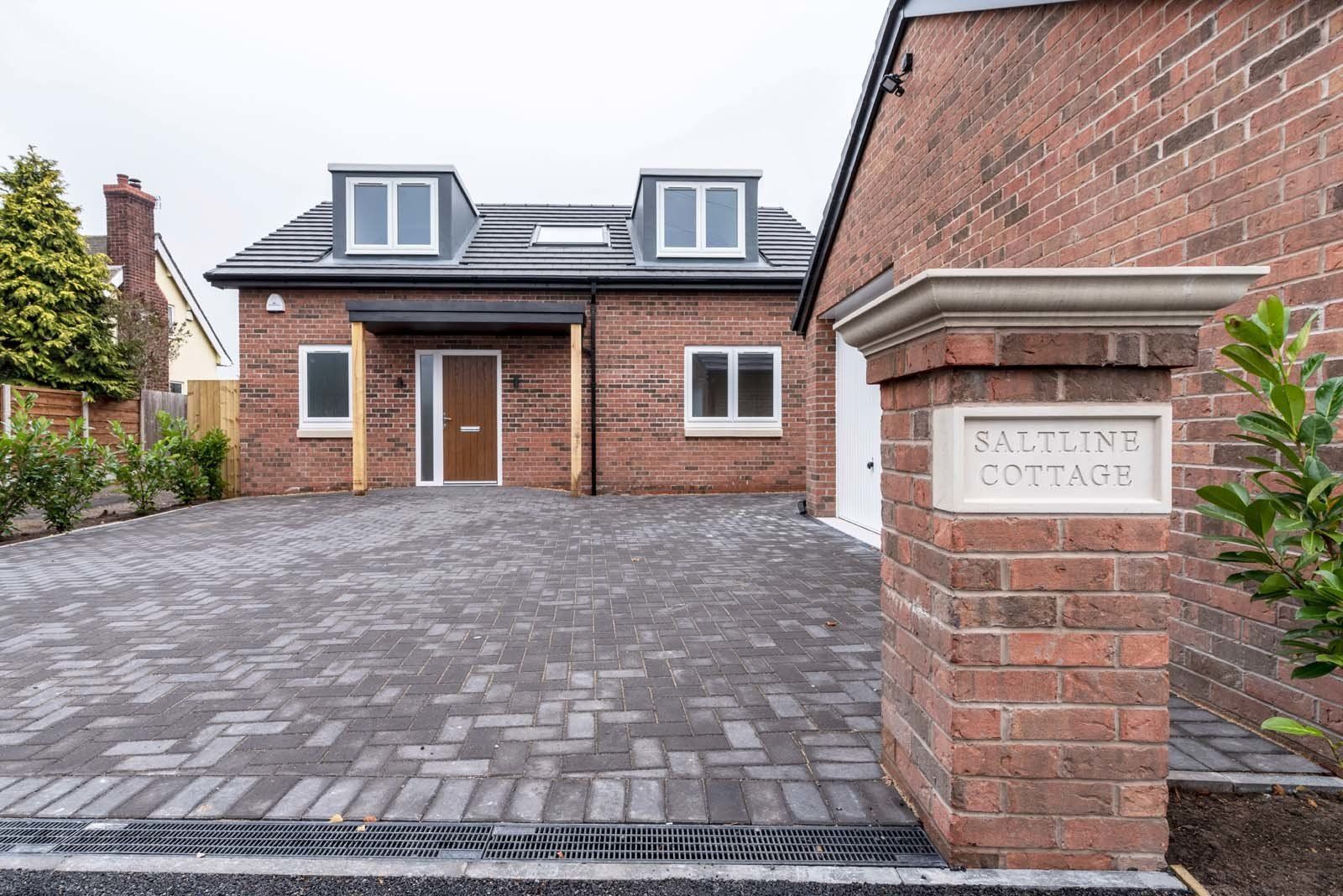 Front elevation of contemporary dormer bungalow in Cheshire, built by Rawlinson Construction