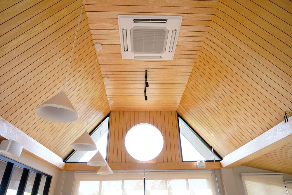 A Room With a Wooden Ceiling and a Ceiling Fan — Unger Air in South Tamworth, NSW