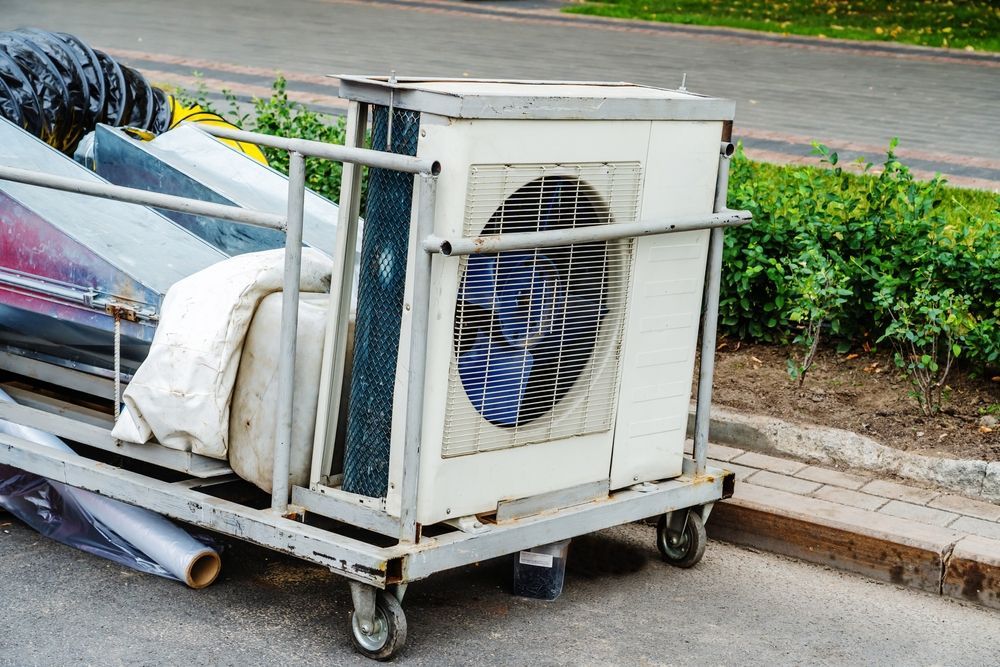 White Air Conditioner Unit Sits — Unger Air in Manilla, NSW