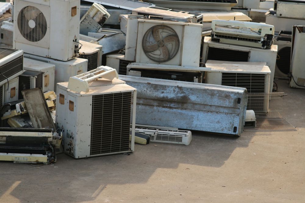 Cluttered Pile of Discarded White Air Conditioning — Unger Air in Quirindi, NSW
