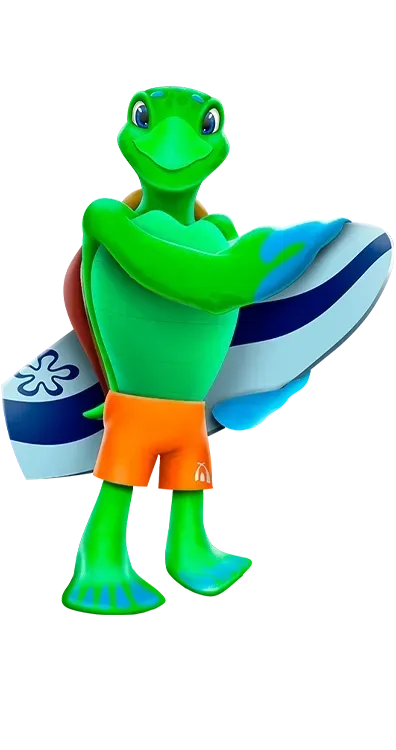 Uma tartaruga verde de desenho animado está segurando uma prancha de surfe