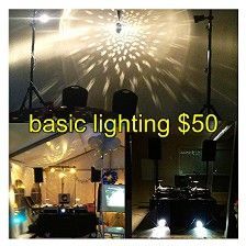DJ lighting setup including speaker stands, lights, and a disco ball, priced at $50.