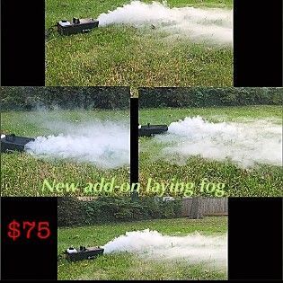A fog machine on grass emits a low-lying cloud. Text: 