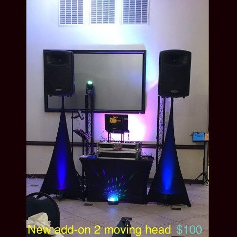 DJ setup with speakers, lights, and mixing equipment at an event, with an add-on price.