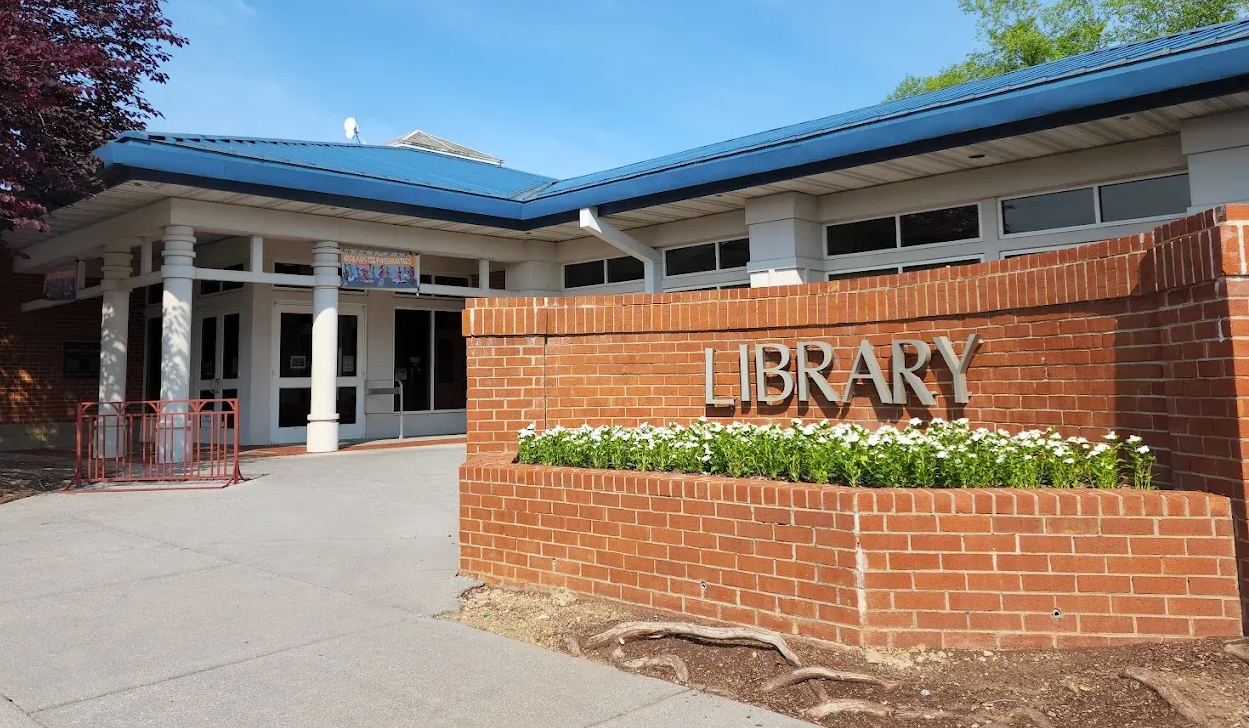 Library entrance, brick sign with