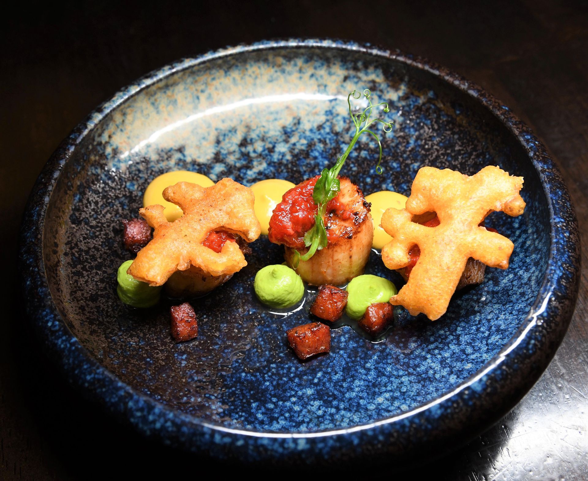 A close up of a plate of food on a table.