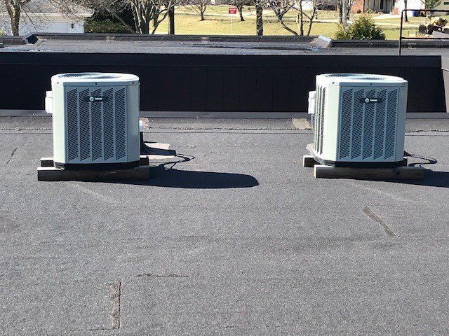 HVAC Tech Working — Neenah, WI — Central Temperature Equipment Service Inc.