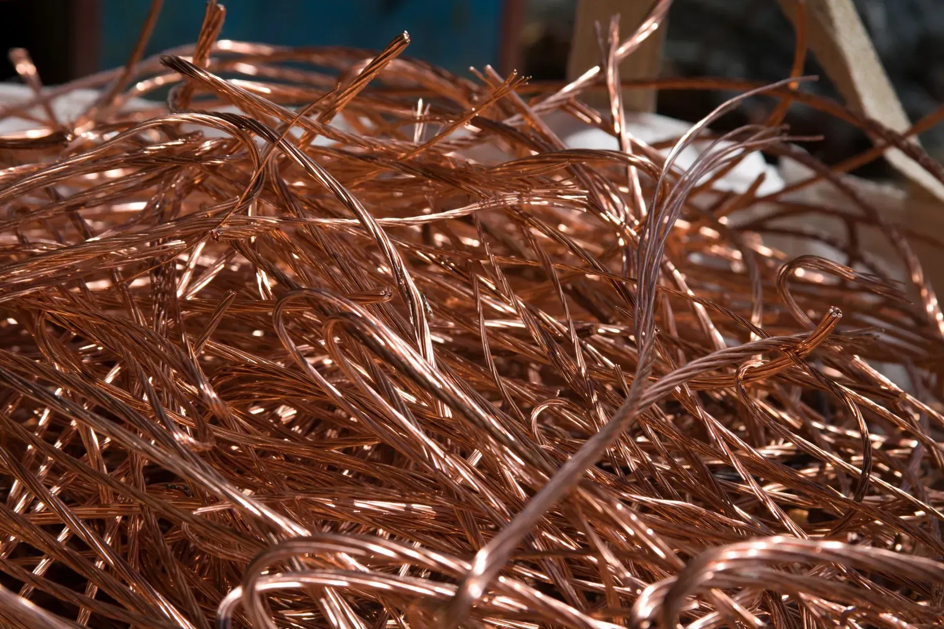 A pile of copper wire is sitting on top of a table.