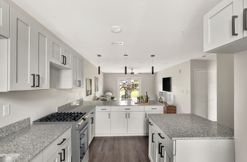 Huntington Forest kitchen with granite countertops and modern appliances