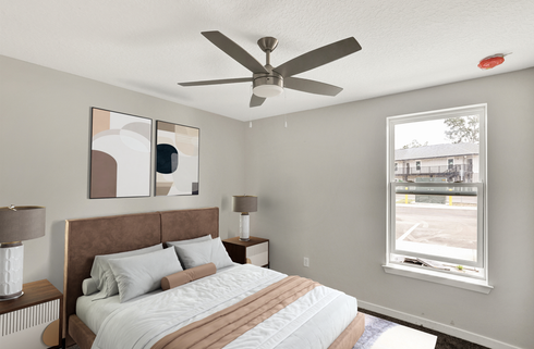 Huntington Forest bedroom with wood plank flooring