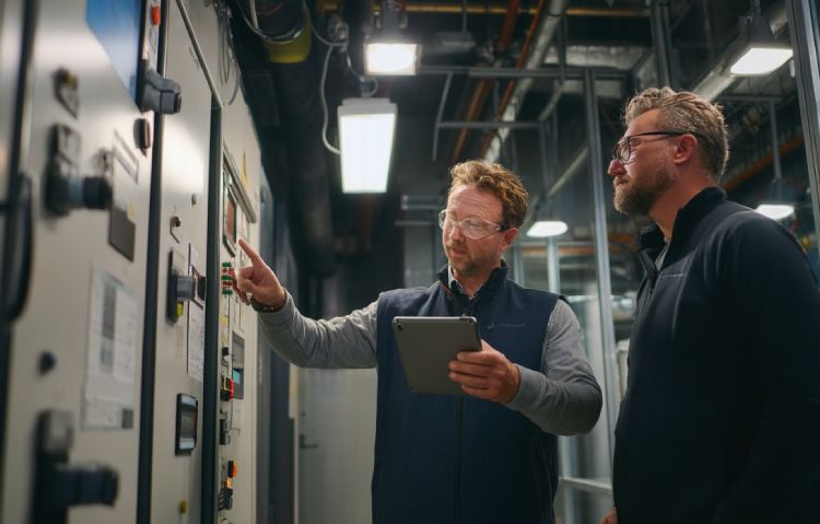 elevator consultant reviewing digital performance data
