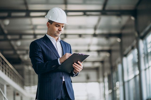 man engineer hard hat building