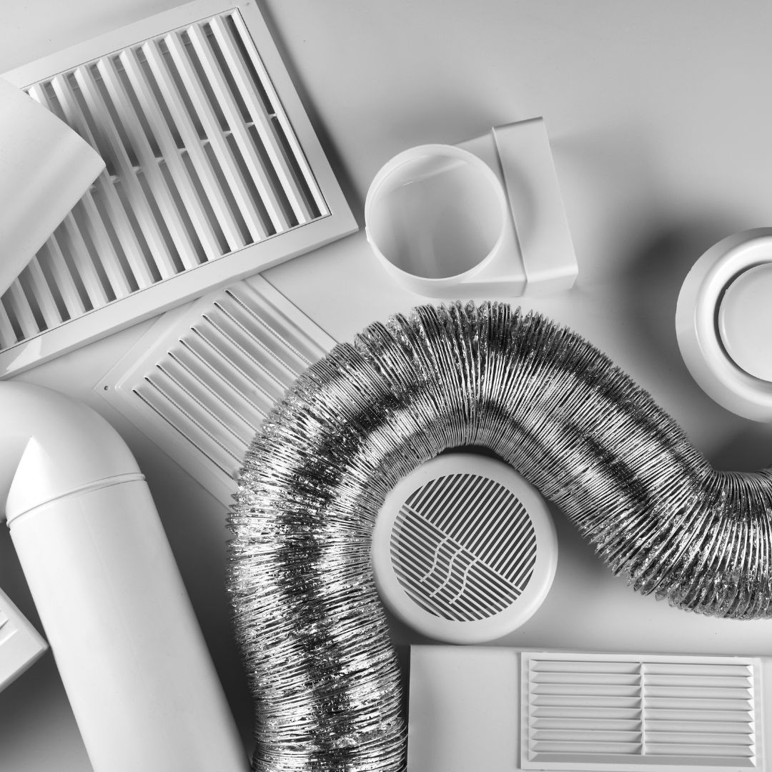 There are many different types of air vents and ducts on the table.