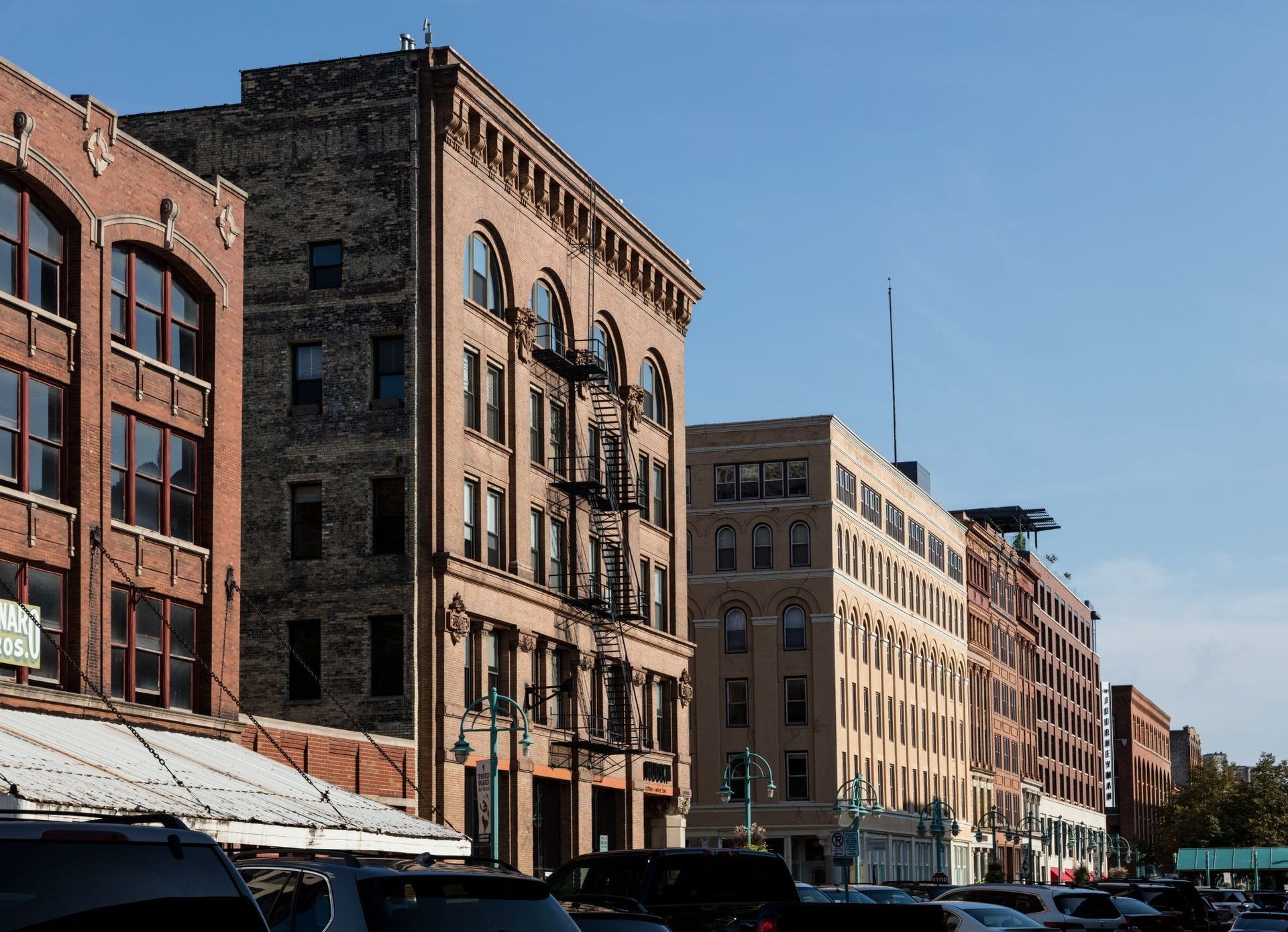 A brick building with a fire escape on the side of it