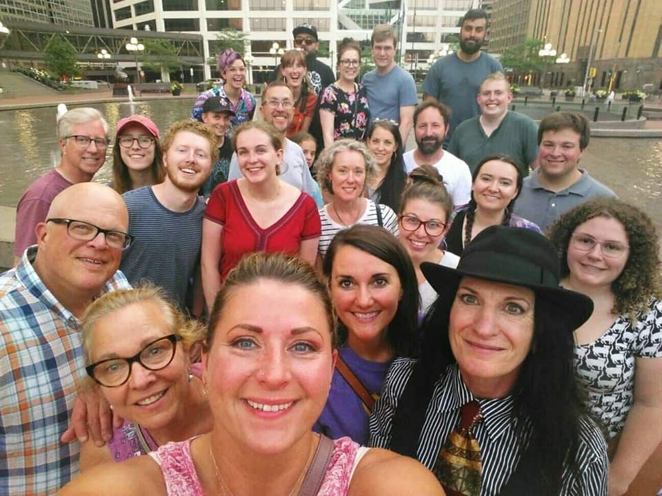 A group of people are posing for a picture together