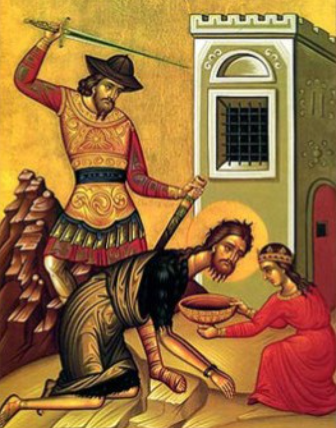 Man being beheaded; soldier swings sword, woman collects blood, and building in the background.