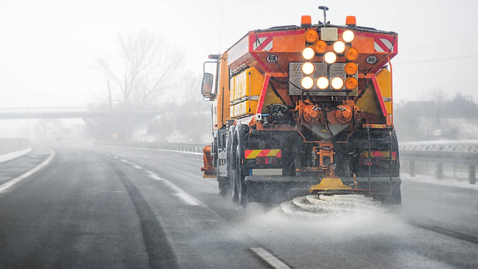A snow plow salting the roads during a snowstorm near Lexington, Kentucky (KY)