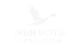 Iron Goose Construction logo with a faint flying goose silhouette on a white background