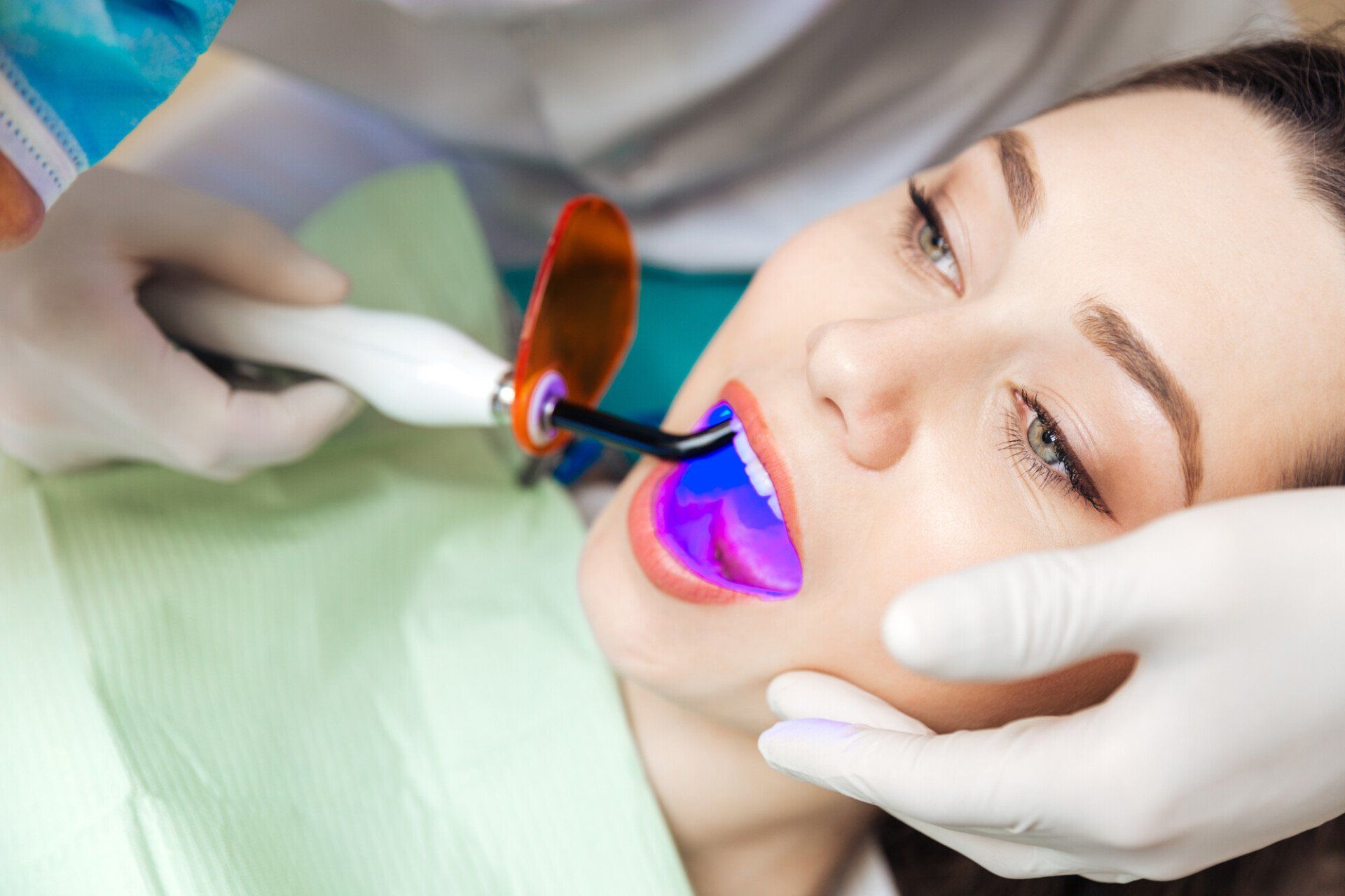 lady getting a laser dentistry