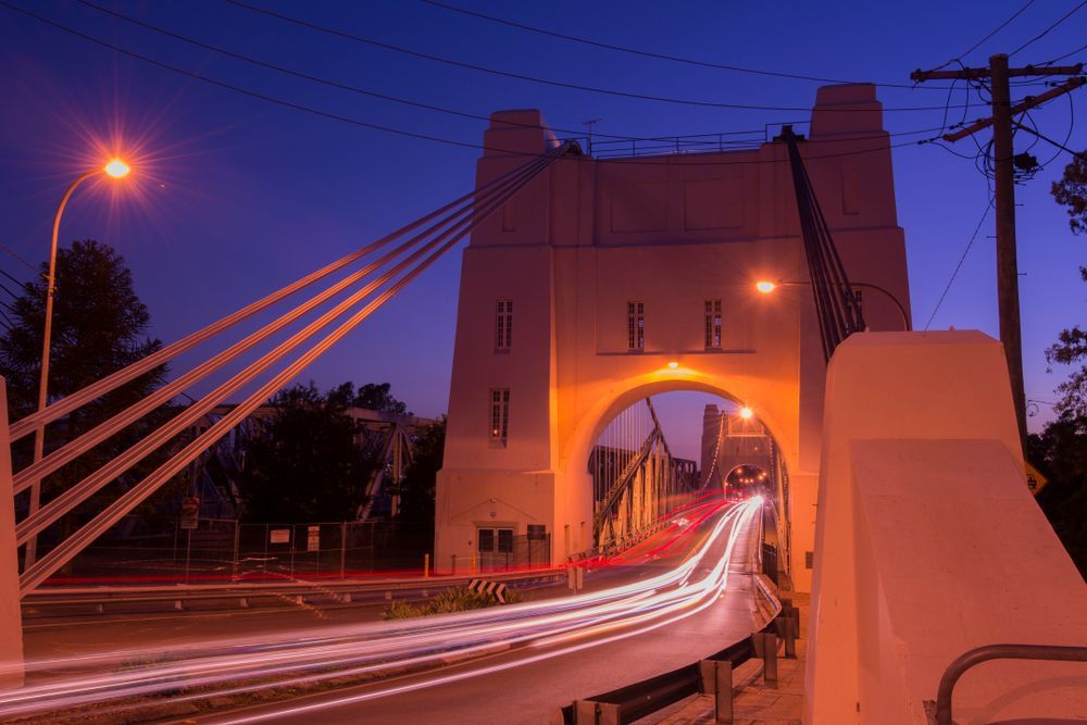 A Bridge With A Lot Of Lights On It At Night — Australian Rock Walls In Brisbane, QLD