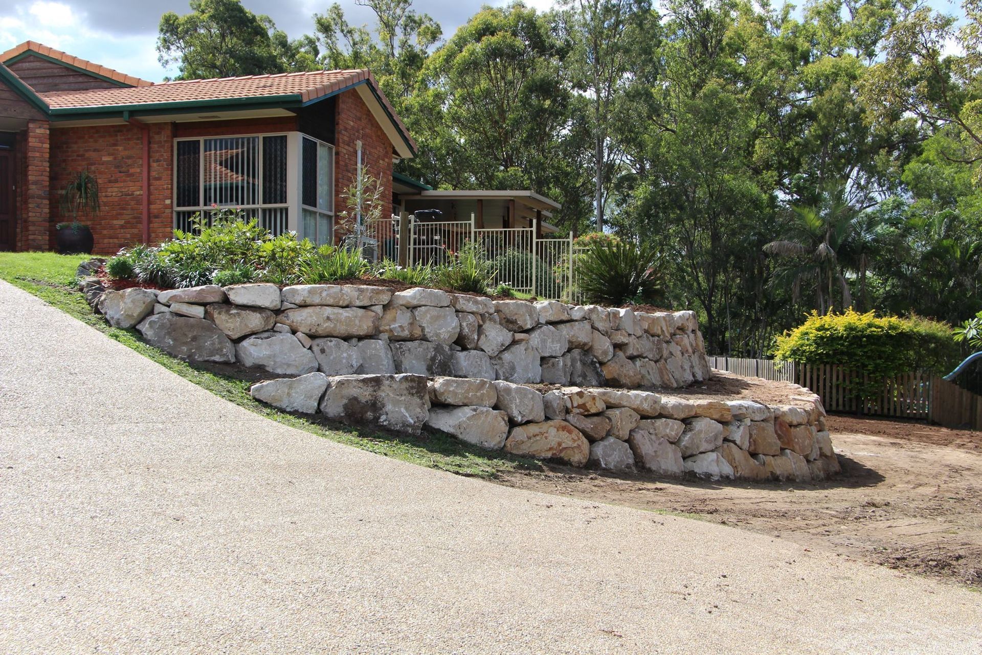 Retaining Walls Around The Front Yard Of The Property