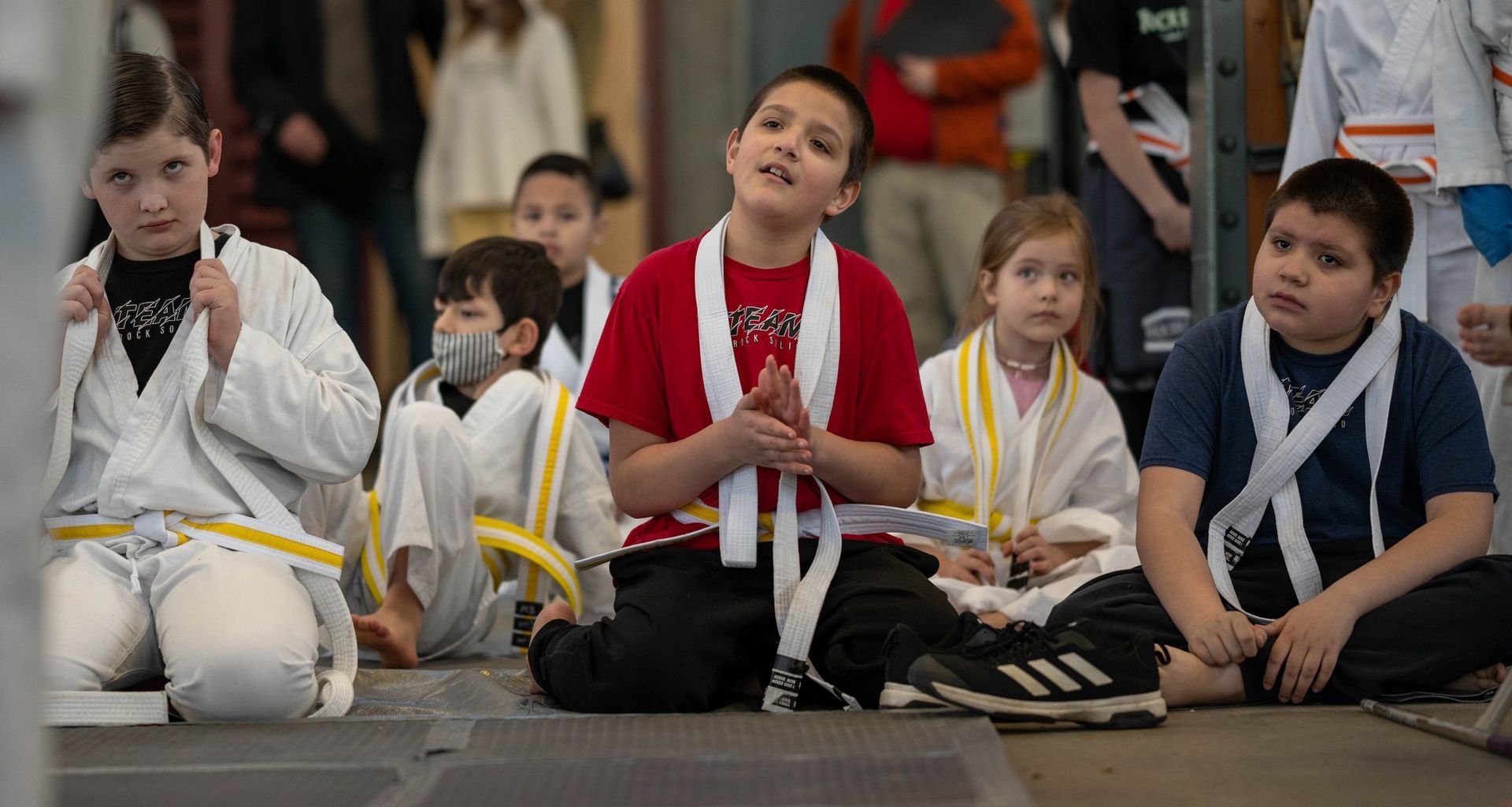kids celebrating after a successful martial arts class