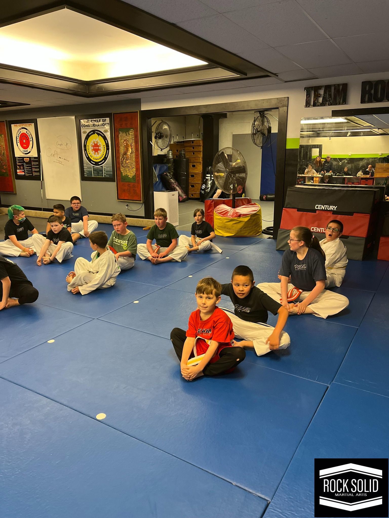 martial arts class in full swing with engaged kids