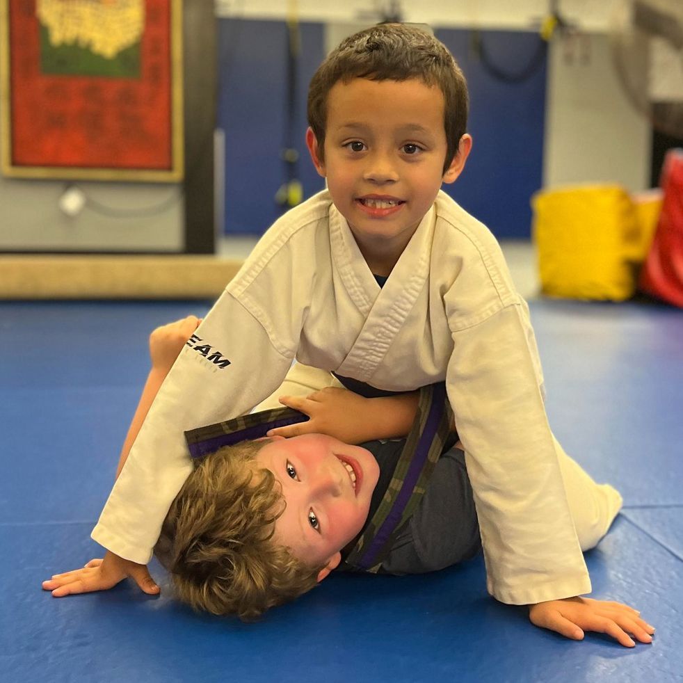 engaged kids during a lively martial arts lesson
