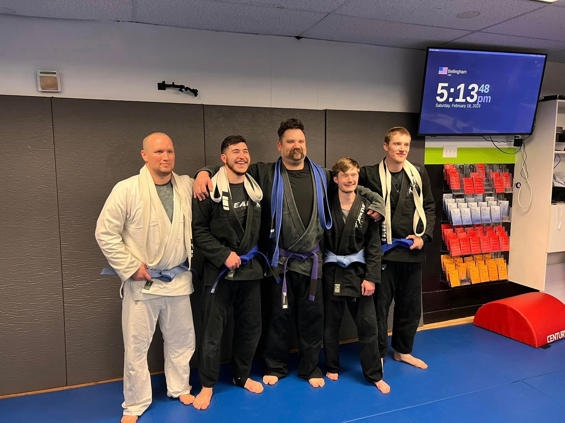 mixed martial arts students posing together