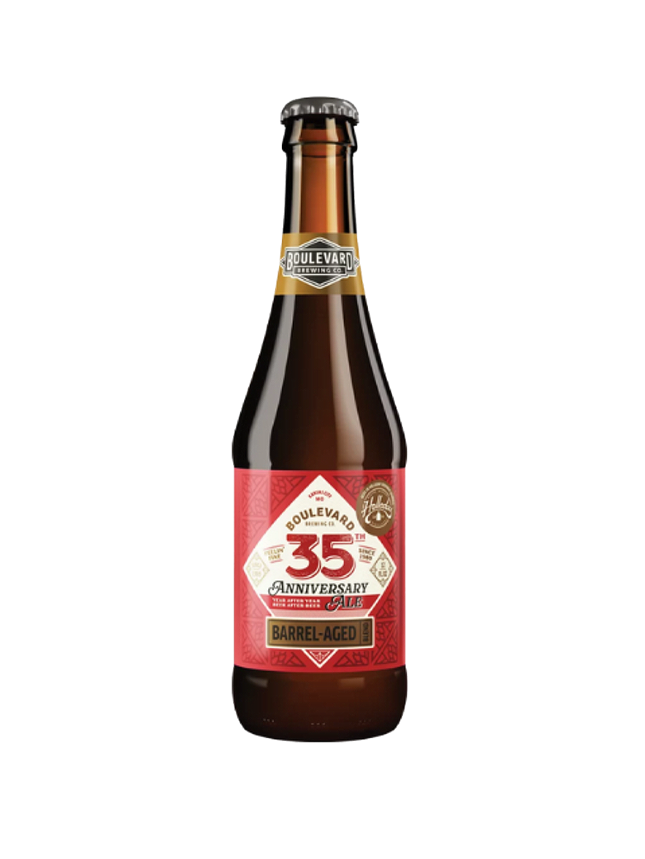Bottle of Bohemian 35 Anniversary Barrel Aged beer, red label, brown glass.