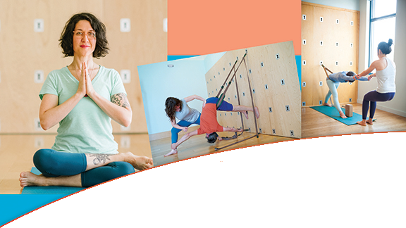 A woman is sitting on a yoga mat next to a picture of a woman doing Pilates