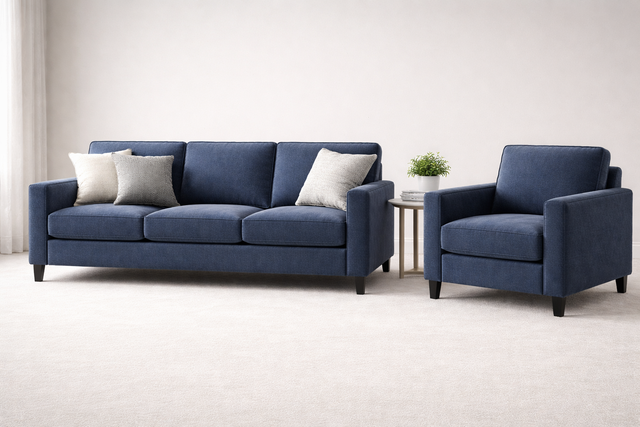 A carpet cleaning wand with a bristle brush cleans a strip of a detailed, patterned area rug.