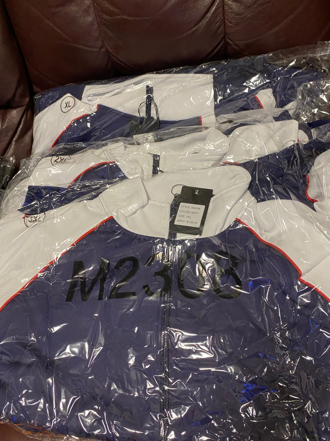 Track jackets — navy/white