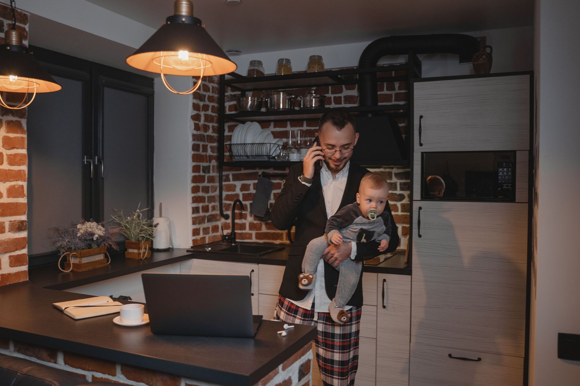Father holding son showing work life balance as a realtor