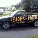 Black pickup truck with yellow