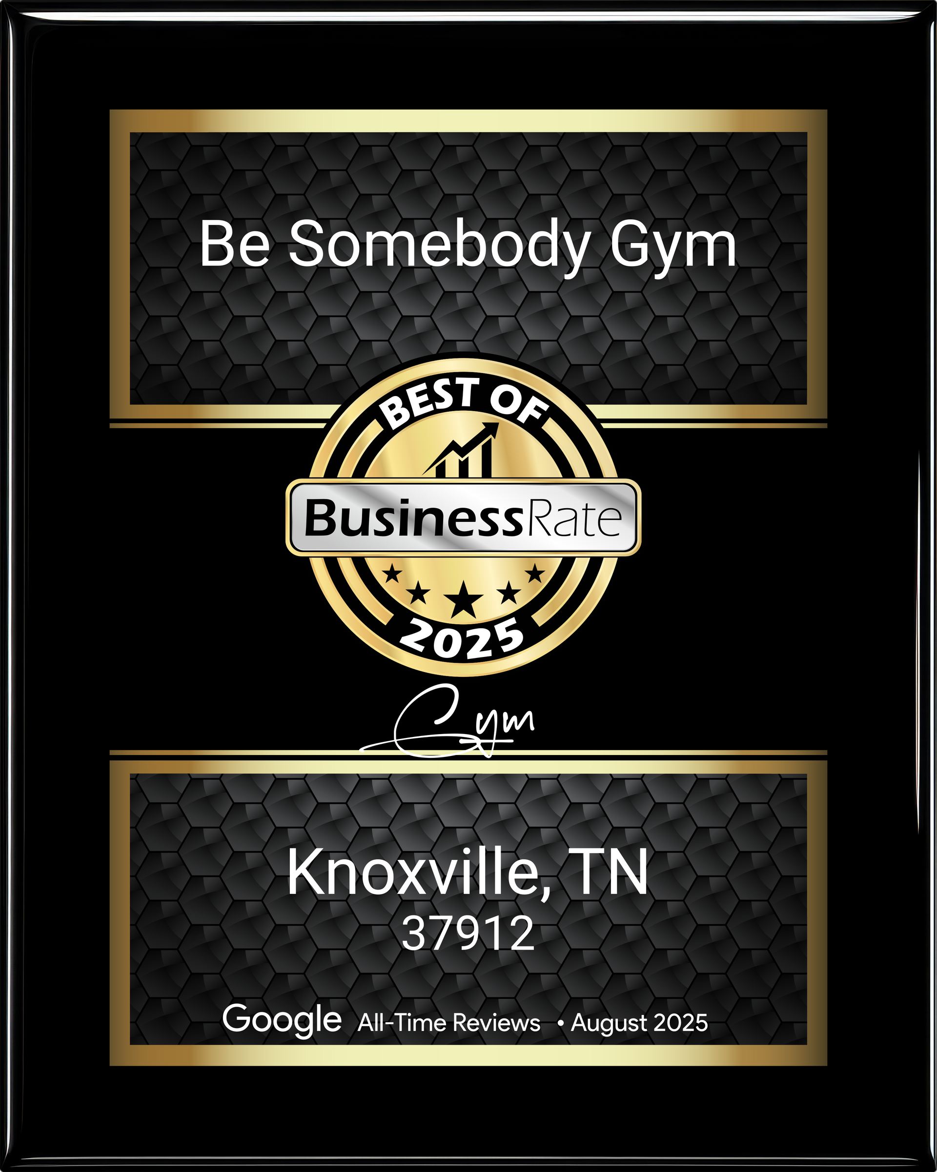 A black and gold award plaque for