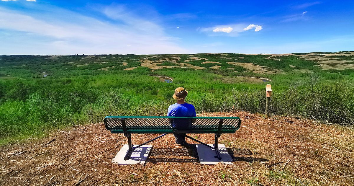 A lookout bench is located on the trails maintained by the Wainwright Wildlife Society.
