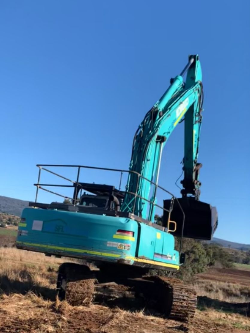 A Blue Bulldozer With a Detached Track Assembly — GA Plant & Automotive Repairs In Taminda, NSW
