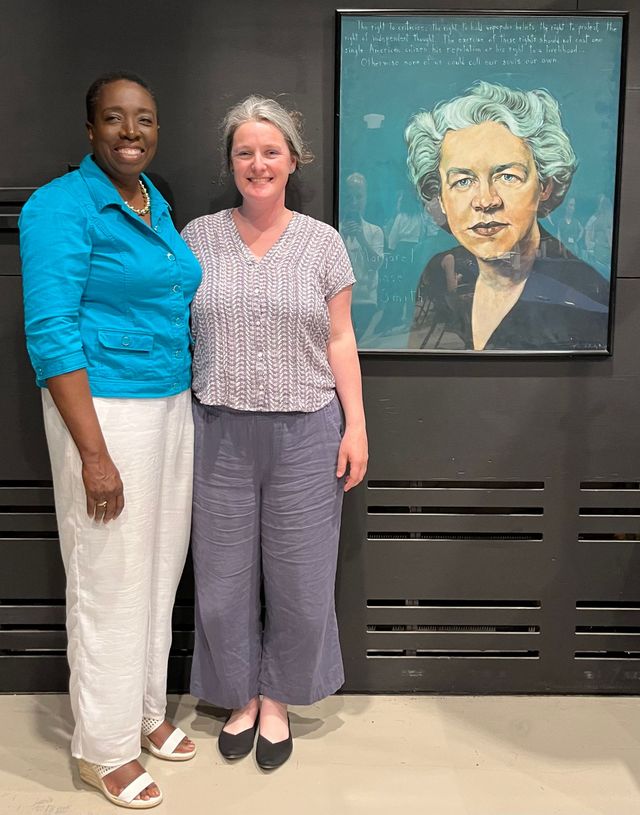 photo of Dr. Josiah-martin standing with a colleague at the Maine national education for women in leadership conference