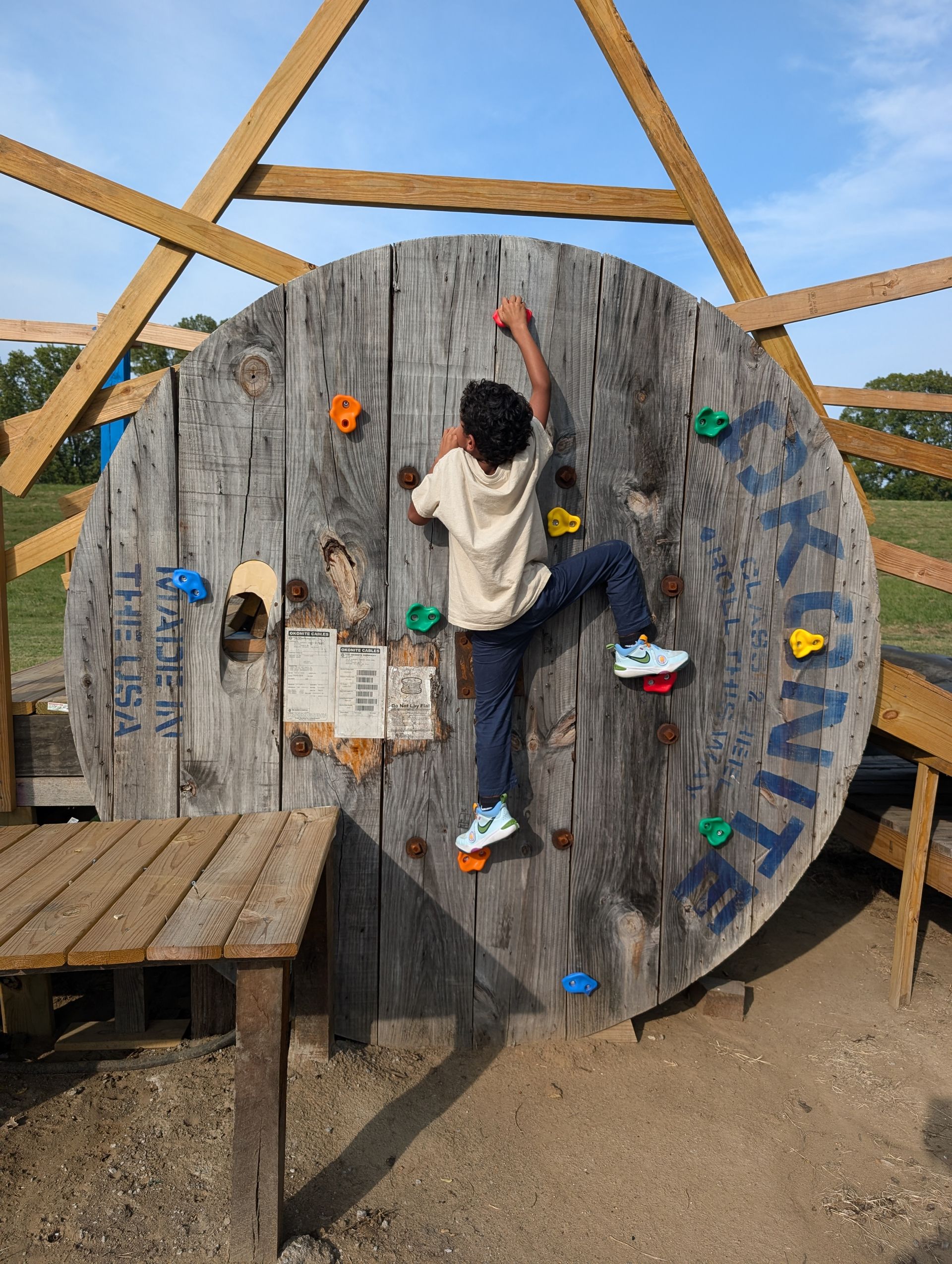 An advertisement for a low ropes obstacle course